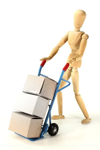 Parcel service with doll — Stock Photo, Image