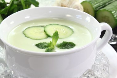 Iced cucumber soup with garlic clipart