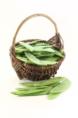 Sugar peas in a basket clipart