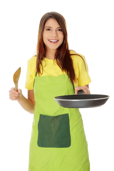 Jonge vrouw koken — Stockfoto
