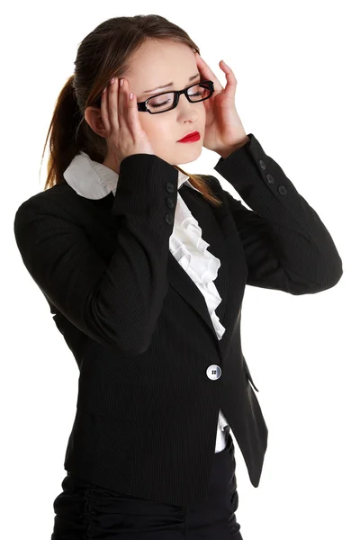 Business woman böljande huvudvärk — Stockfoto