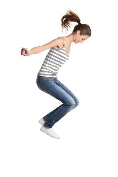 Chica adolescente saltando . Fotos De Stock