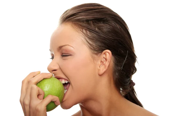 Красива жінка з зеленим яблуком — стокове фото