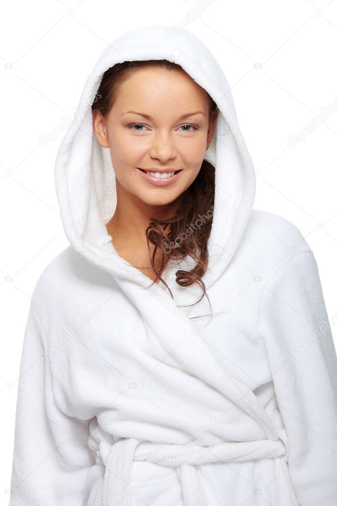 Young beautiful happy woman in bathrobe