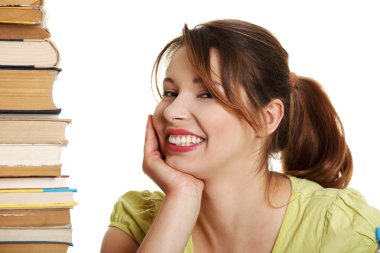 Young caucasian woman (student) with books clipart