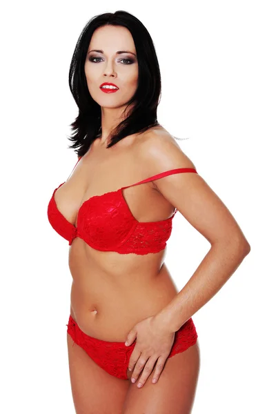 Жінка в сексуальній червоній нижній білизні — стокове фото