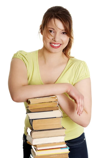 Mujer joven caucásica (estudiante) con libros —  Fotos de Stock
