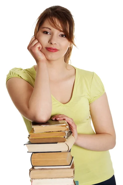 Mujer joven caucásica (estudiante) con libros —  Fotos de Stock