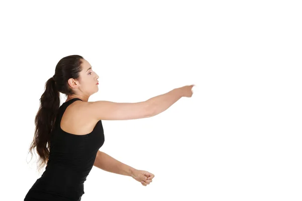 Side view of young woman with fists up — Stock Photo, Image