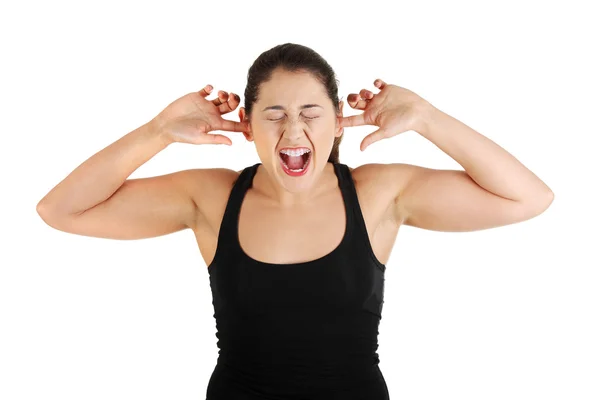 Teen plugging her ears and shouting — Stock Photo, Image