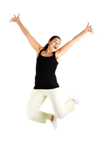 Mladá šťastná žena skákající do vzduchu — Stock fotografie