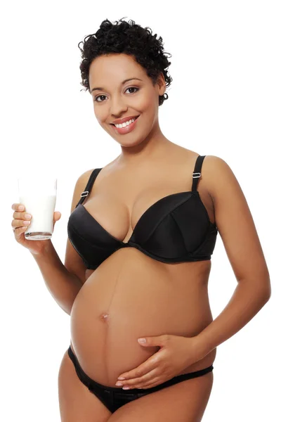 Kobieta w ciąży zadowolony, ubrany w czarny bielizna. — Zdjęcie stockowe