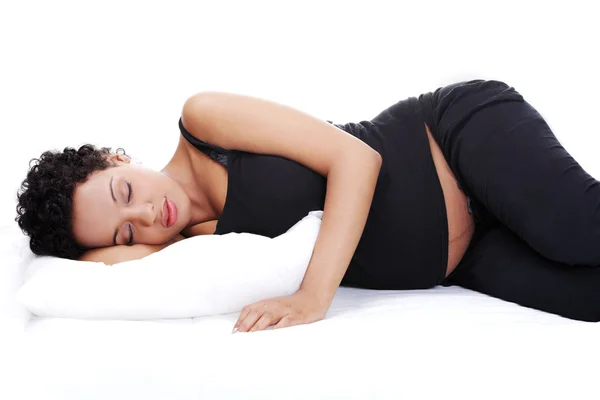 Mujer embarazada mientras duerme . — Foto de Stock