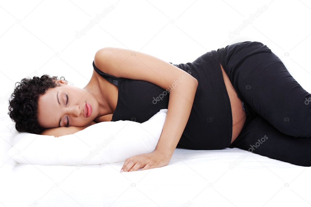 Pregnant woman while sleeping.