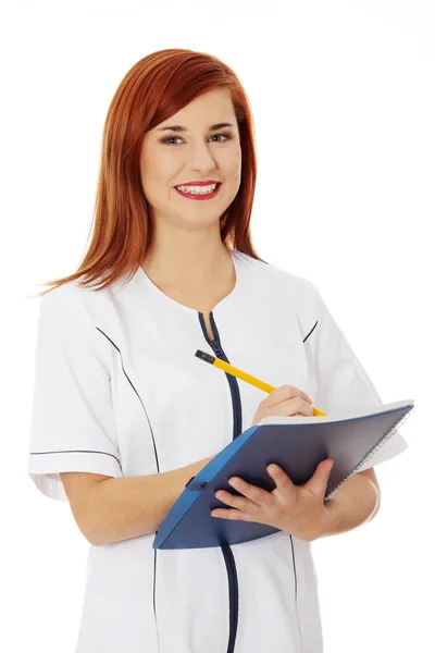 Smiling medical doctor or nurse. — Stock Photo, Image