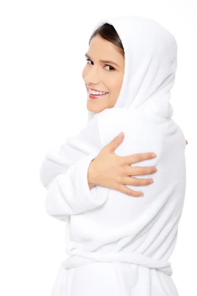 Young beautiful happy woman in bathrobe — Stock Photo, Image