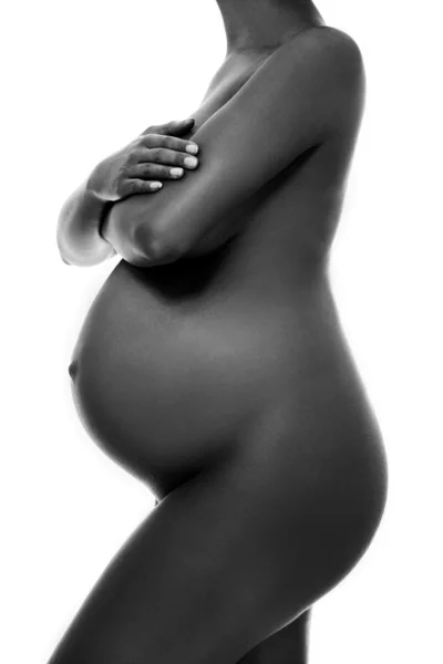 Mujer embarazada que se muestra desnuda . — Foto de Stock