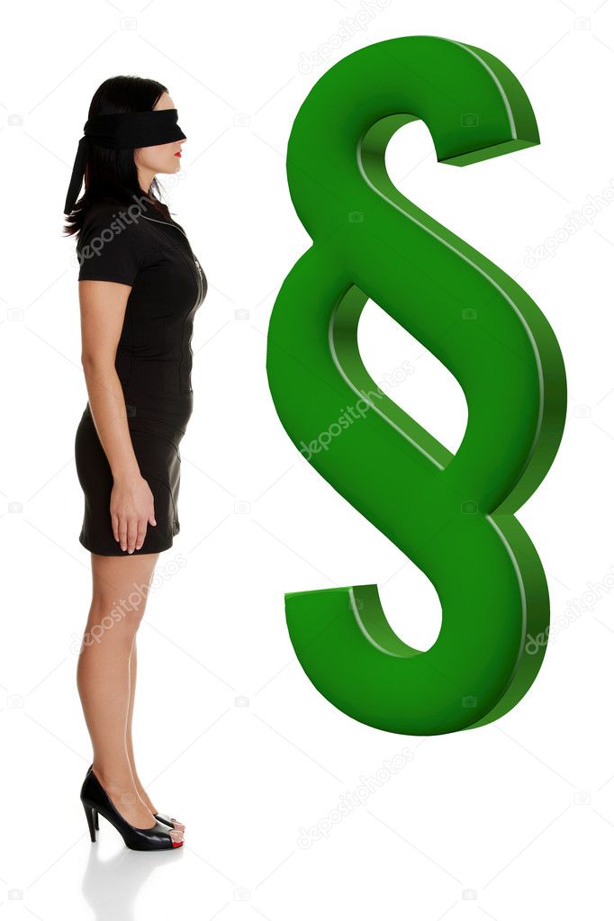 Blindfold woman standing next to big green paragraph symbol.