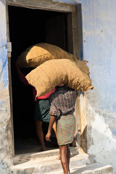 Stock image Man with jute bag in India