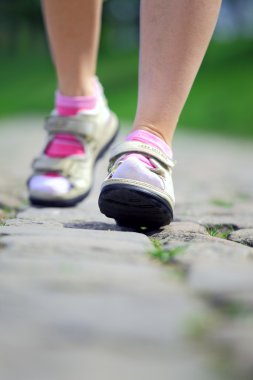 Active woman on a walk clipart