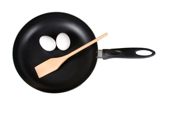 Frying pan,eggs and spatula — Stock Photo, Image
