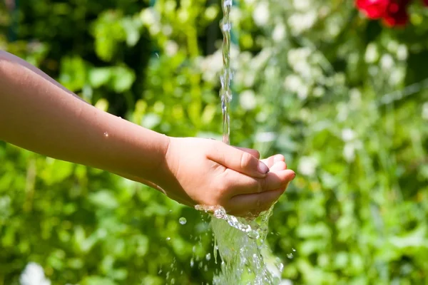 Clear water and hands — Stock Photo, Image