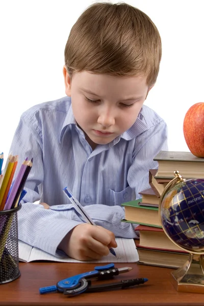 Boy does homework — Stock Photo, Image