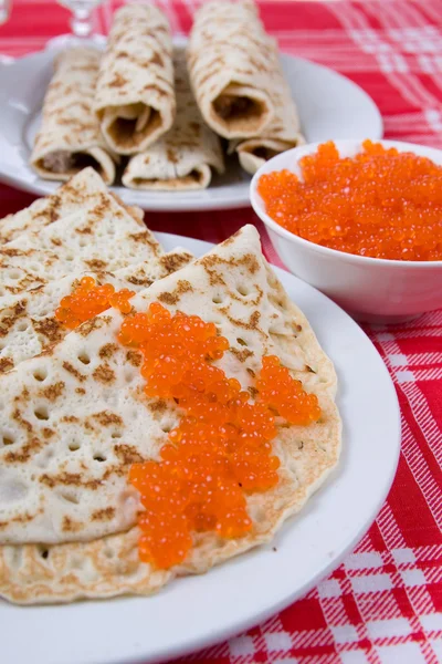 Pancakes with red caviar. — Stock Photo, Image
