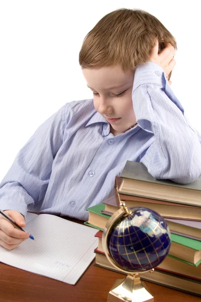 Boy does homework — Stock Photo, Image