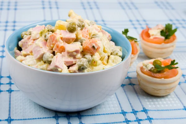 stock image Russian traditional salad olivier with pea