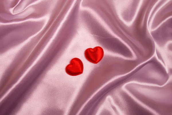 Pink fabric and hearts — Stock Photo, Image