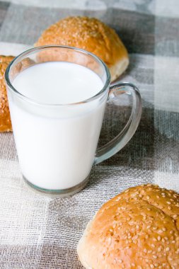 Glass of milk and biscuits clipart