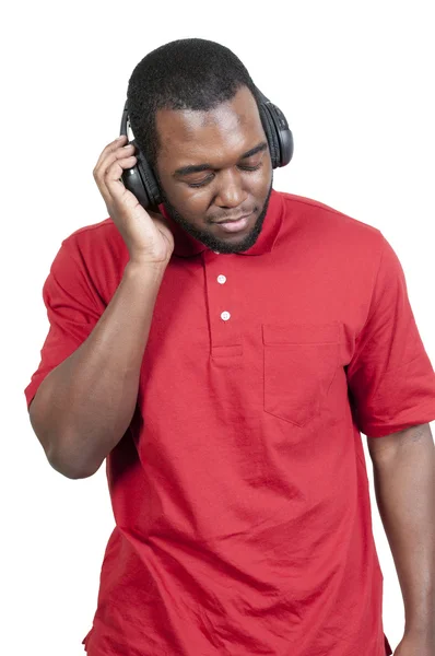 Muž poslouchající sluchátka — Stock fotografie