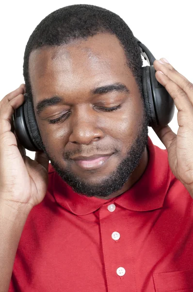 Людина слухає навушники — стокове фото