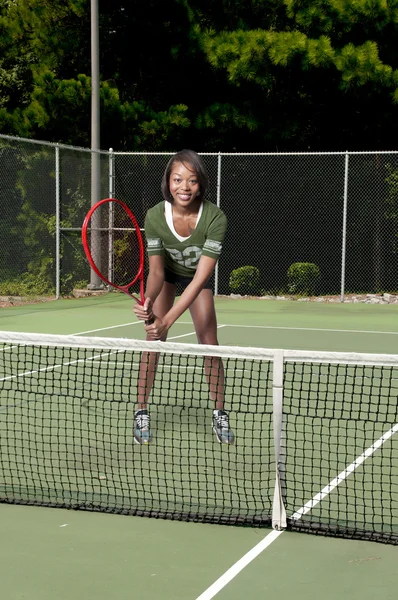 Mulher no campo de ténis — Fotografia de Stock