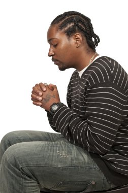 Black man praying