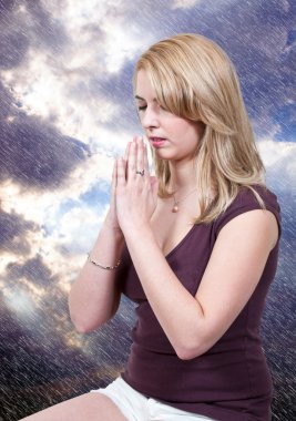 Woman praying clipart