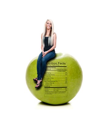 Woman Sitting on Red Delicious Apple with Nutrition Label clipart