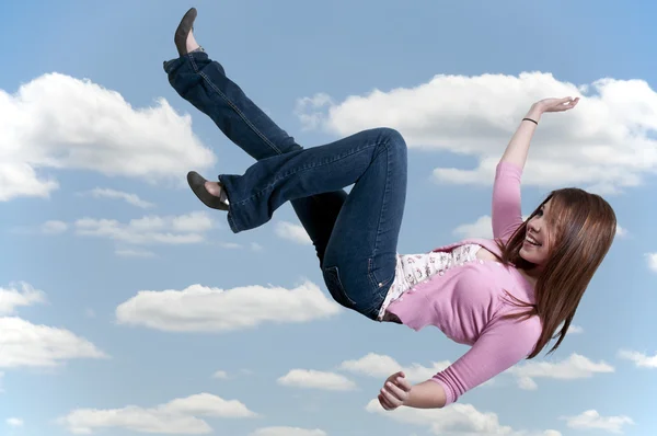 Žena padající přes oblohu — Stock fotografie