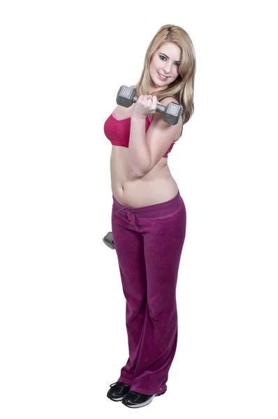 Donna che lavora con pesi — Foto Stock