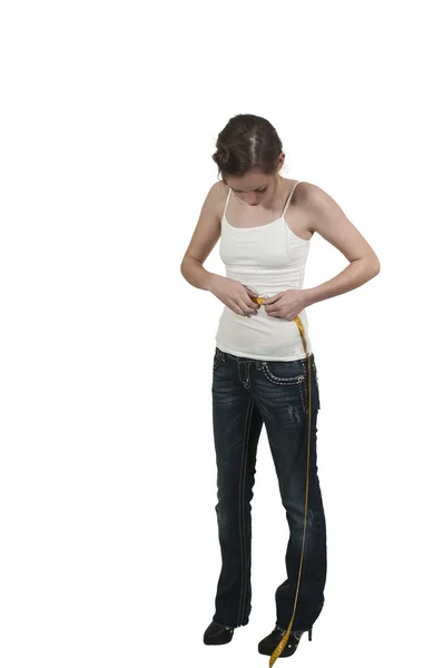 Mulher medindo sua cintura — Fotografia de Stock