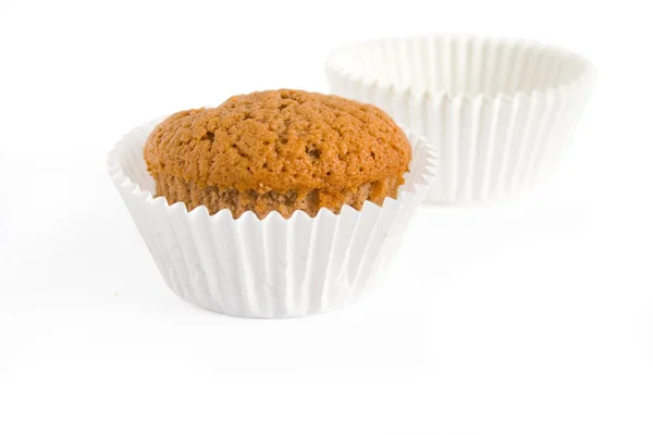 Muffin con tazze di muffin vuote — Foto Stock