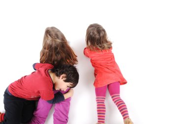 Group of happy playful children in studio clipart