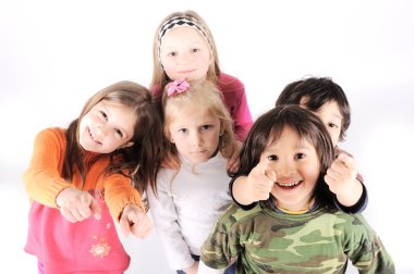 Group of playful children in studio clipart