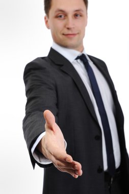 Businessman extending hand to shake clipart