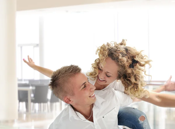 Portrait of a romantic young couple smiling together — Stock Photo, Image