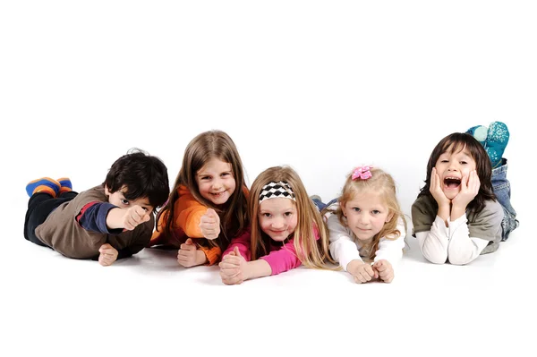 Children group family laying isolated — Stock Photo, Image