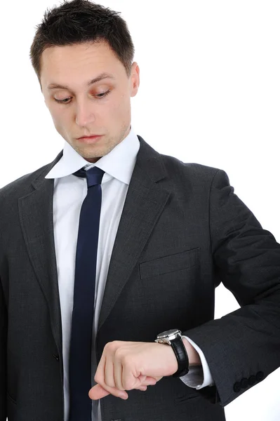 Empresário olhando em seu relógio — Fotografia de Stock