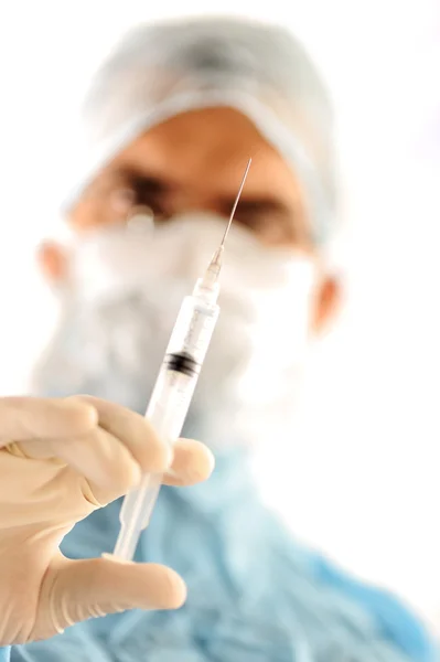 Doctor holding injection — Stock Photo, Image
