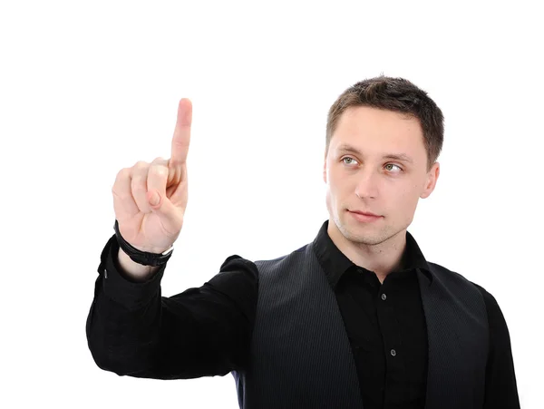 Молодой человек с пальцем, нажимающим цифровую кнопку в воздухе — стоковое фото